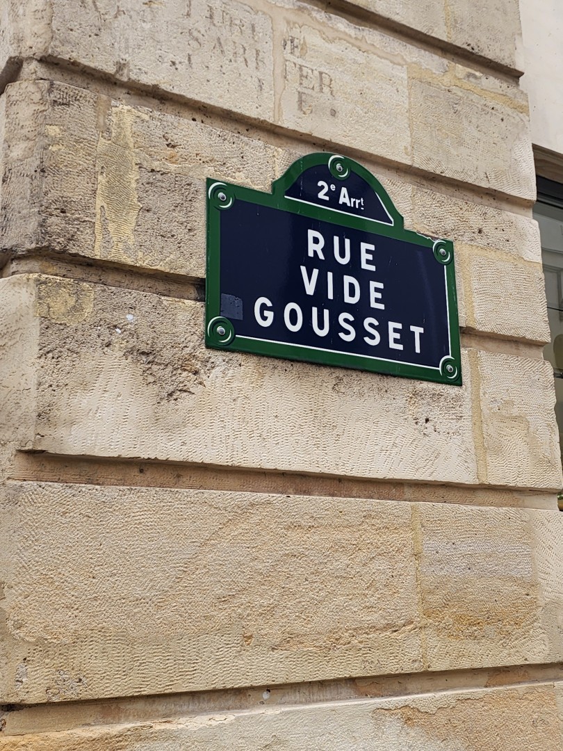 enamel plate of a Paris' street. Caption= rue Vide Gousset meaning "Empty pocket street"