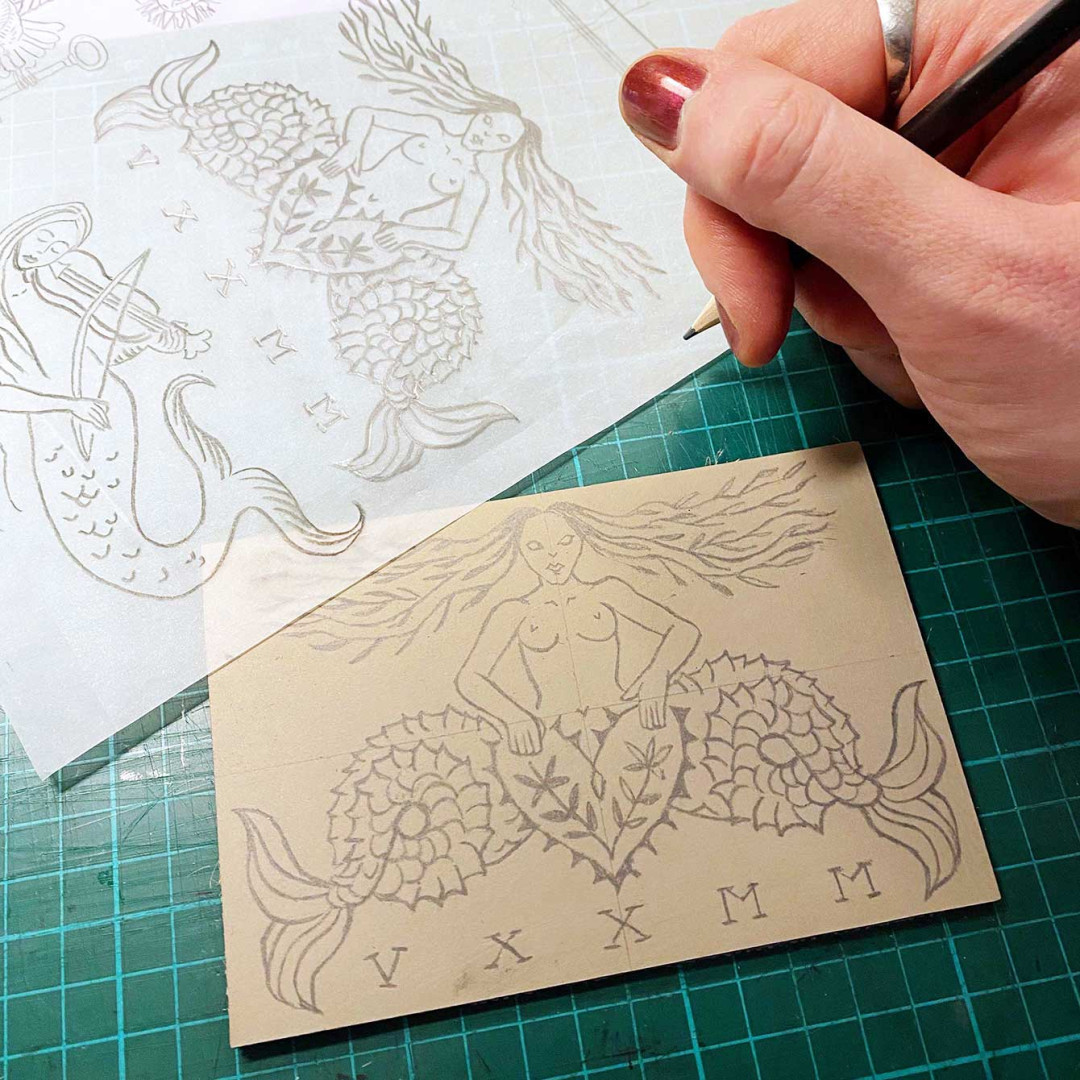 Dessin sur une plaque de linogravure.