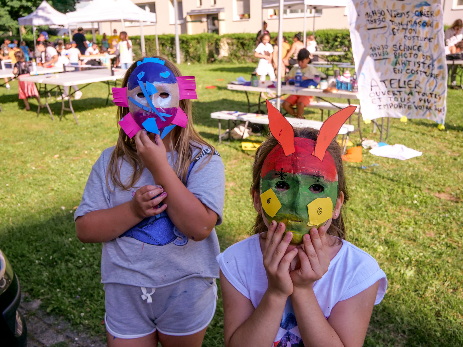 Two kids wearing masks